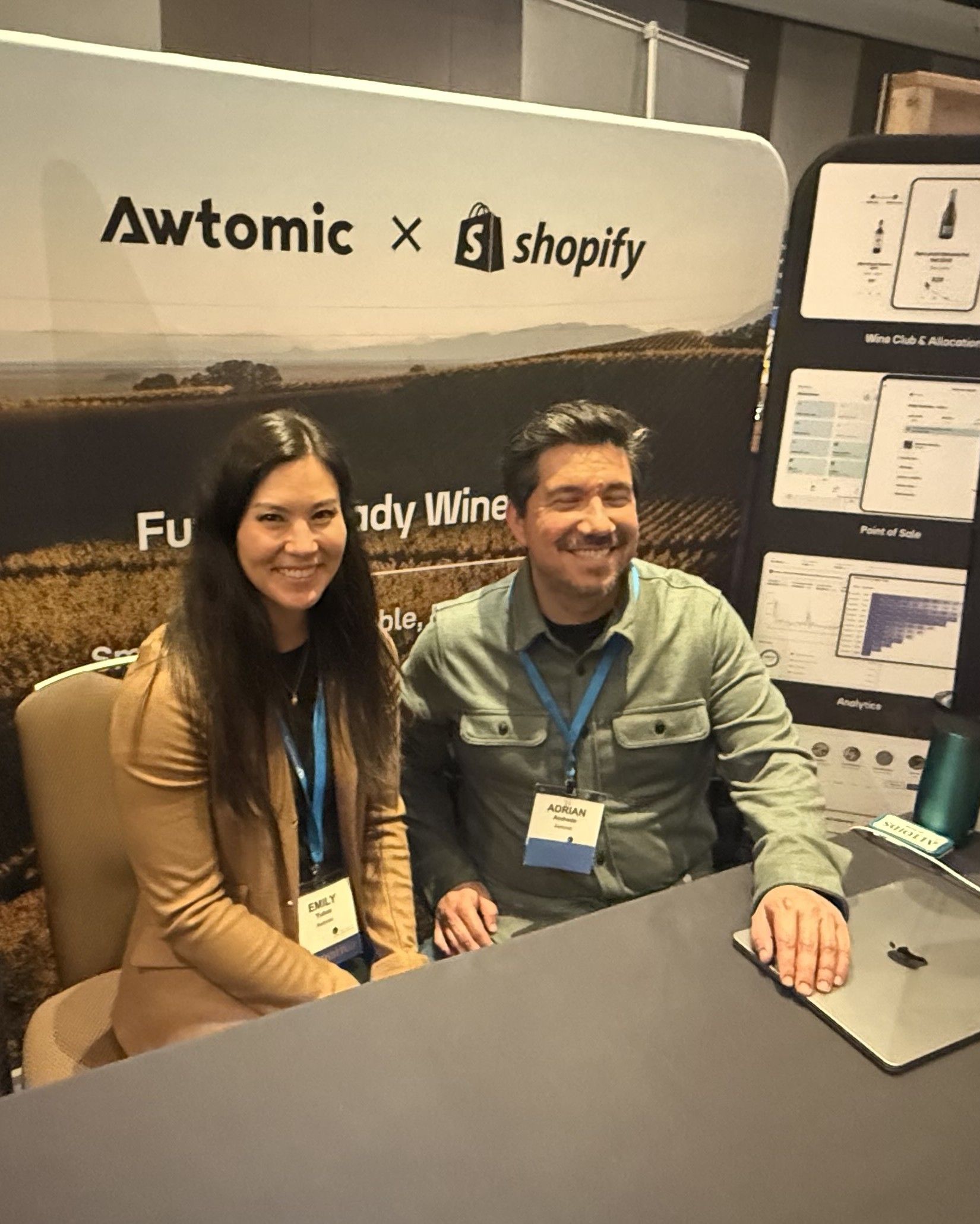 Awtomic co-founders Emily Yuhas and Adrian Andrade at the Awtomic × Shopify booth at the DTC Wine Symposium
